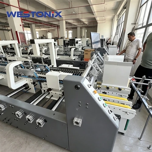 インドの顧客が Westonix 工場を訪問し、-GSF シリーズ 4&6 コーナー フォルダー グルアーの現場検査を行っています